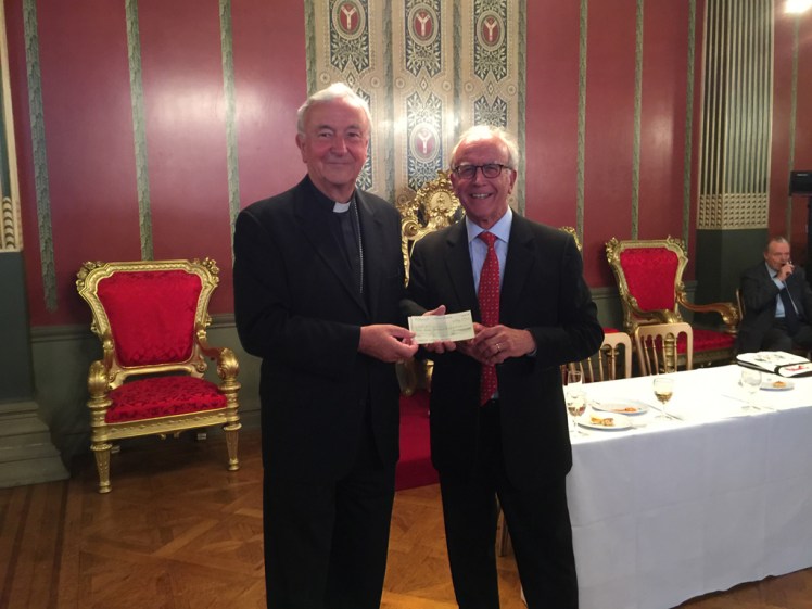 Cardinal and Chairman with this year's cheque